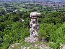 220px-Devils.chimney.at.leckhampton.arp.jpg