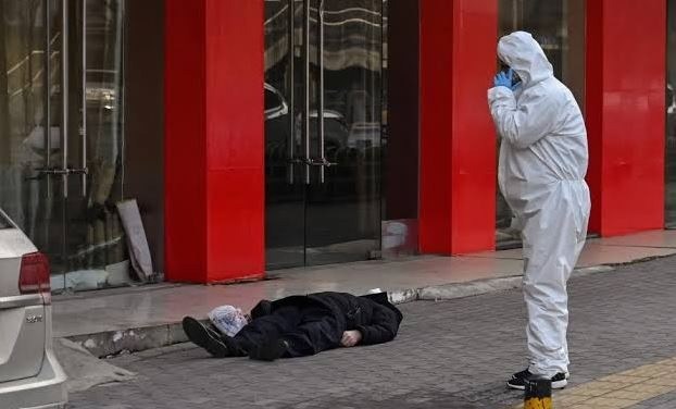 China-Man-found-dead-on-empty-Wuhan-street-amid-virus-outbreak.jpg